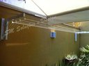 Ver imagem 1 de Varal Dobravel Parede /Muro até 6M - Ideal para Area Externa