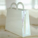 Ver imagem 1 de Revisteiro em Acrílico Branco ou Preto em Formato de Sacola - Miami - Branco