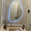 Ver imagem 3 de Espelho Orgânico Lapidado com Led 85x55cm com Led Frio e Bateria