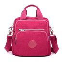 Ver imagem 1 de Bolsa Mochila Multi Uso Nylon com Alça Removível Feminina - Rosa
