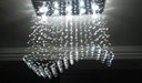 Ver imagem 1 de Lustre Onda em Cristais Mesa de Jantar Base 70x20:base Inox Espelhada/0,70cm/110v/220v (bivolt)