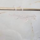 Ver mais imagens de Conjunto 25 Cabides de Lojas para Lingerie Cristal com Encaixe para Alças Expositores