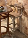 Ver imagem 2 de Banqueta Alta Bar em Madeira com Braço. Assento em Rattan Natural. Cor Natural