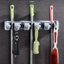 Ver imagem 1 de Suporte Multiuso Porta Vassoura Lavanderia Funcional Cabos