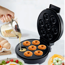 Ver mais imagens de Maquina Fazer Rosquinhas Antiaderente com 7 Unidades 110v