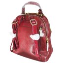 Ver imagem 5 de Mochila Poliuretano Chic com Listras Chenson Bordô