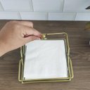 Ver imagem 5 de Porta Guardanapo De Mesa Dourado Com Espelho Suporte Para Guardanapo com Peso Duler