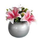 Ver imagem 1 de Arranjo de Mesa Flores de Lírios no Vaso Prateado Vidro