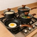 Ver imagem 5 de Conjunto de Panelas Antiaderente Preto com Tampa de Vidro - 4 Peças