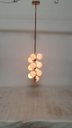 Ver imagem 2 de PENDENTE VERTICAL COM BOLAS BRANCAS DE VIDRO BRANCO ESTRUTURA ROSÉ 12 LÂMPADAS JABUTICABA