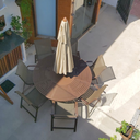 Ver imagem 1 de Jogo de Mesa Giratória com 6 Cadeiras Lótus e Guarda Sol