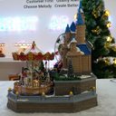 Ver mais imagens de Parque de Diversoes Natal Natalino Gigante Papai Noel Arvore Led Enfeite Musical Giratorio Decoraçao