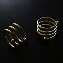 Ver imagem 3 de Anel de Guardanapo de Tecido em Espiral - Metal Dourado, 2 Lugares
