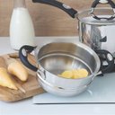 Ver imagem 4 de Conjunto de Panelas Tramontina Duo Silicone Aço Inox com Fundo Triplo Cabos Alças Silicone 5pçs