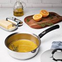 Ver imagem 5 de Conjunto de Panelas Tramontina Duo Silicone Aço Inox com Fundo Triplo Cabos Alças Silicone 5pçs