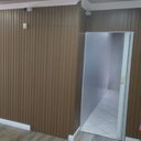 Ver imagem 2 de Painel Ripado Pvc 25cm X 2,70m Relevo Ipê Régua
