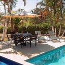 Ver imagem 1 de Kit Sarah com 6 Poltronas e Mesa com Giro Interno com Espreguiçadeiras e Área Gourmet Casa