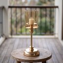 Ver imagem 3 de Castiçal Dourado em Metal com Vidro Âmbar Removível 31 x 12 cm