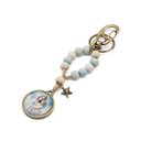 Ver imagem 3 de Chaveiro Dezena Mãezinha do Céu Madeira Fornecedor 1 F1-ct23-360