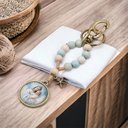 Ver imagem 2 de Chaveiro Dezena Mãezinha do Céu Madeira Fornecedor 1 F1-ct23-360