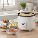 Ver imagem 6 de Panela Elétrica 1,3l 127v - 400w Tampa de Vidro Saída de Vapor Função Aquecimento Rev. Antiaderente