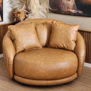 Poltrona Ayla Giratória Redonda Couro Sintético e Almofadas Larbelle Moderna e Confortável