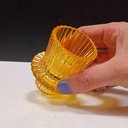 Ver mais imagens de Castiçal Decorativo de Vidro Amarelo 7x6x6cm Porta Vela Mesa Jantar Decoração