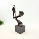 Ver mais imagens de Escultura Homem Subindo Escada Bronze 34x14x14cm