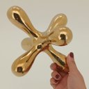 Ver imagem 4 de Adorno Decorativo de Metal Dourado 19x19x19cm Enfeite Mesa Estante Sala Aparador