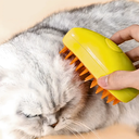 Ver imagem 2 de Escova Autolimpante 3 em 1 para Pets a Vapor com Spray