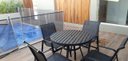 Ver imagem 4 de Jogo de Mesa Ripada 1,00m 4 Cadeiras de Alumínio Preta para Piscina e Jardim