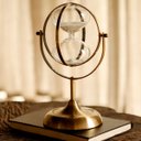 Ver imagem 3 de Ampulheta Decorativa Bronze Globe 30 Minutos Areia Branca Luxo Decoração 29 cm