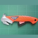 Ver mais imagens de Estilete Japonês para Abrir de Embalagens Corte de Fitas e Cintos Nt Cutter R-1200P