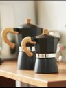 Ver imagem 2 de Cafeteira Italiana Moka 300 Ml 6 Xicaras na Cor Preta com Cabo de Madeira