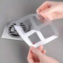 Ver imagem 4 de Kit 50 Filtro Adesivo Ralo Banheiro Retém Cabelo Descartável