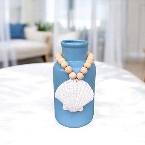 Vaso Decorativo Garrafa Azul Claro com Colar de Concha