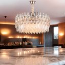 Ver imagem 2 de Lustre Clássico Malásia em Metal e Cristal para Sala de Jantar e Ambientes Modernos - 40x80cm