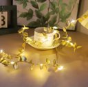 Ver imagem 1 de Fio de Ouro Decorativo com Luzes LED e Folhas Douradas Cordao Luminoso Flexível para Decoração de Am
