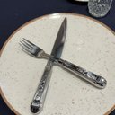 Ver imagem 5 de Faca de Mesa para Churrasco Aço Inox 24cm Modelo Prateada Lâmina Serrilhada Talher