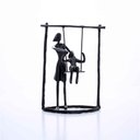 Ver imagem 1 de Escultura Decorativa em Metal Preto Balanço 18x13,5 cm - D’Rossi