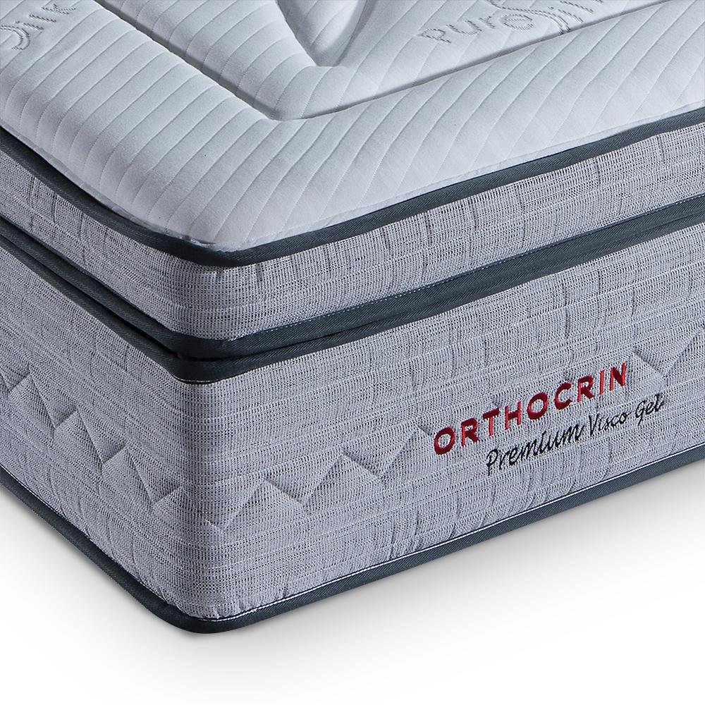 Pessoa acordando bem disposta e sem dores em um colchão ortopédico de alta performance