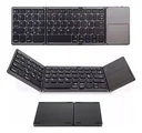 Ver imagem 1 de Mini Teclado sem Fio Recarregável Portátil Touchpad Dobrável Bluetooth