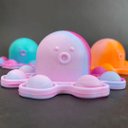 Ver imagem 5 de Chaveiro Polvo Reversível Pop It Fidget Toy Brinquedo Anti Stress Apertar TikTok Silicone Sensorial 