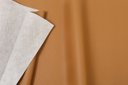 Ver imagem 5 de Poltrona Womb Chair com Puff em Couro Ecológico - Caramelo