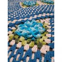 Ver imagem 2 de Tapete de Crochê Artesanal Azul com Flor