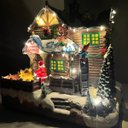 Ver imagem 4 de Vila Natalina Papai Noel Natal Duende Casinha Som LED Rena Giratoria Enfeite Mesa Estante Recepçao C