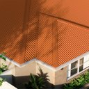 Ver imagem 2 de Telha Sanduiche Ondulada   sem Forro   244cm X 100cm X 1,5cm com Isolamento Térmico em Pir - Kingspan