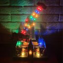 Ver imagem 3 de Parque Natalino Decoracao Natal LED Musical Enfeite de Mesa Sala Estante Bancada Vitrine Loja