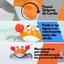 Ver imagem 3 de Caranguejo Deslizante Pimpolho Siri Fujão de Dar Corda Brinquedo Uni para Bebê Criança Laranja