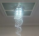 Ver imagem 4 de Lustre De Cristal Espiral, Com 1M de Altura, Com Base de Inox Espelhado com 30Cm de Diâmetro